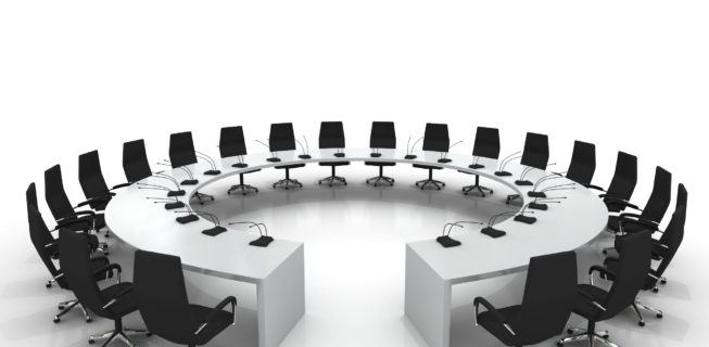 conference table and chairs with microphones