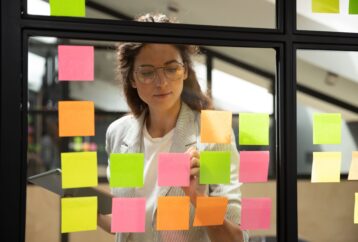 woman with colourful post it notes