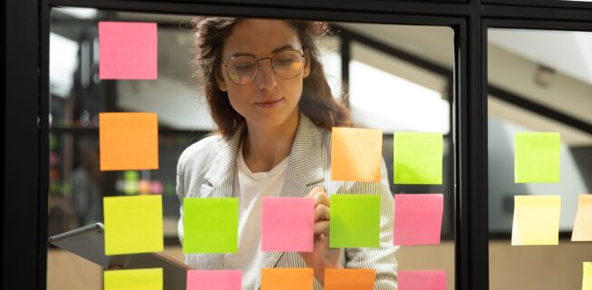 woman with colourful post it notes