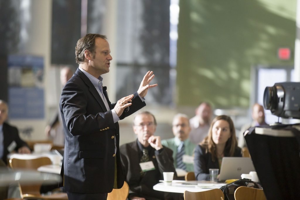 An introvert passionately presenting his ideas