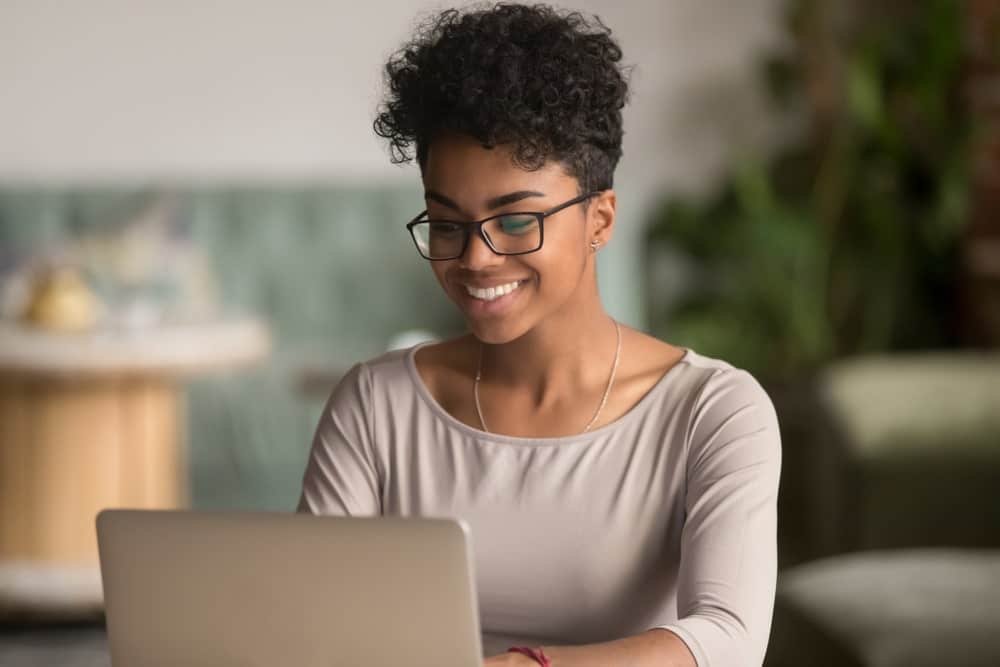 Woman on laptop on webinar