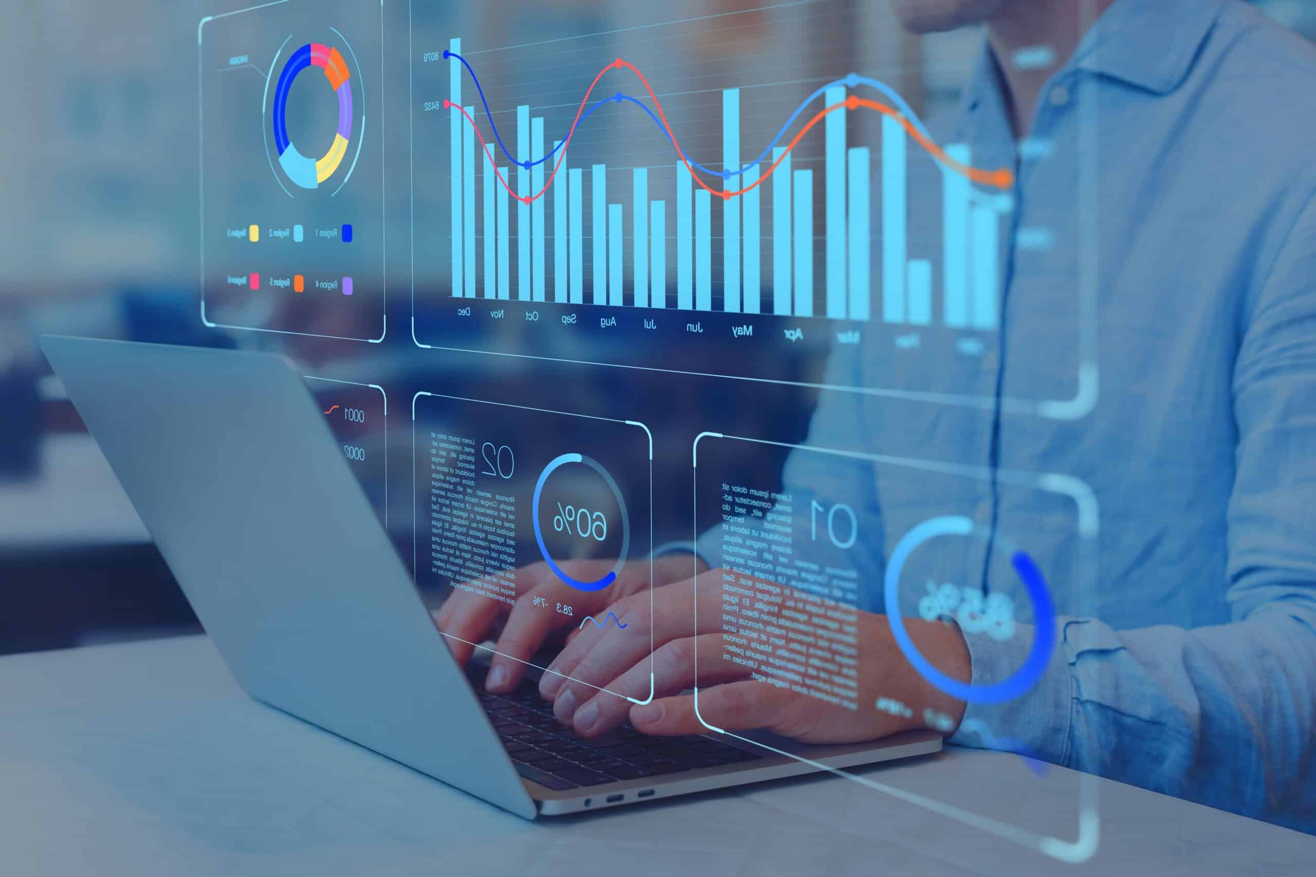man working on laptop with data visualisation
