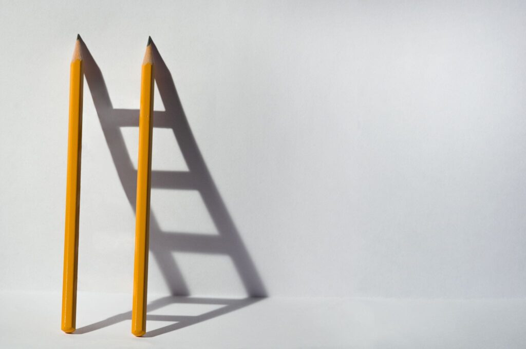 Pencils making a ladder of career progression