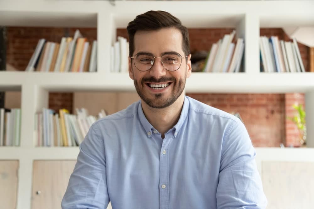 Smiling is essential body language when presenting online
