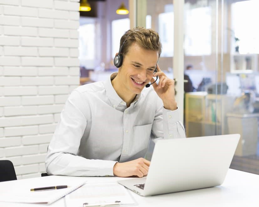 Man on laptop presenting online