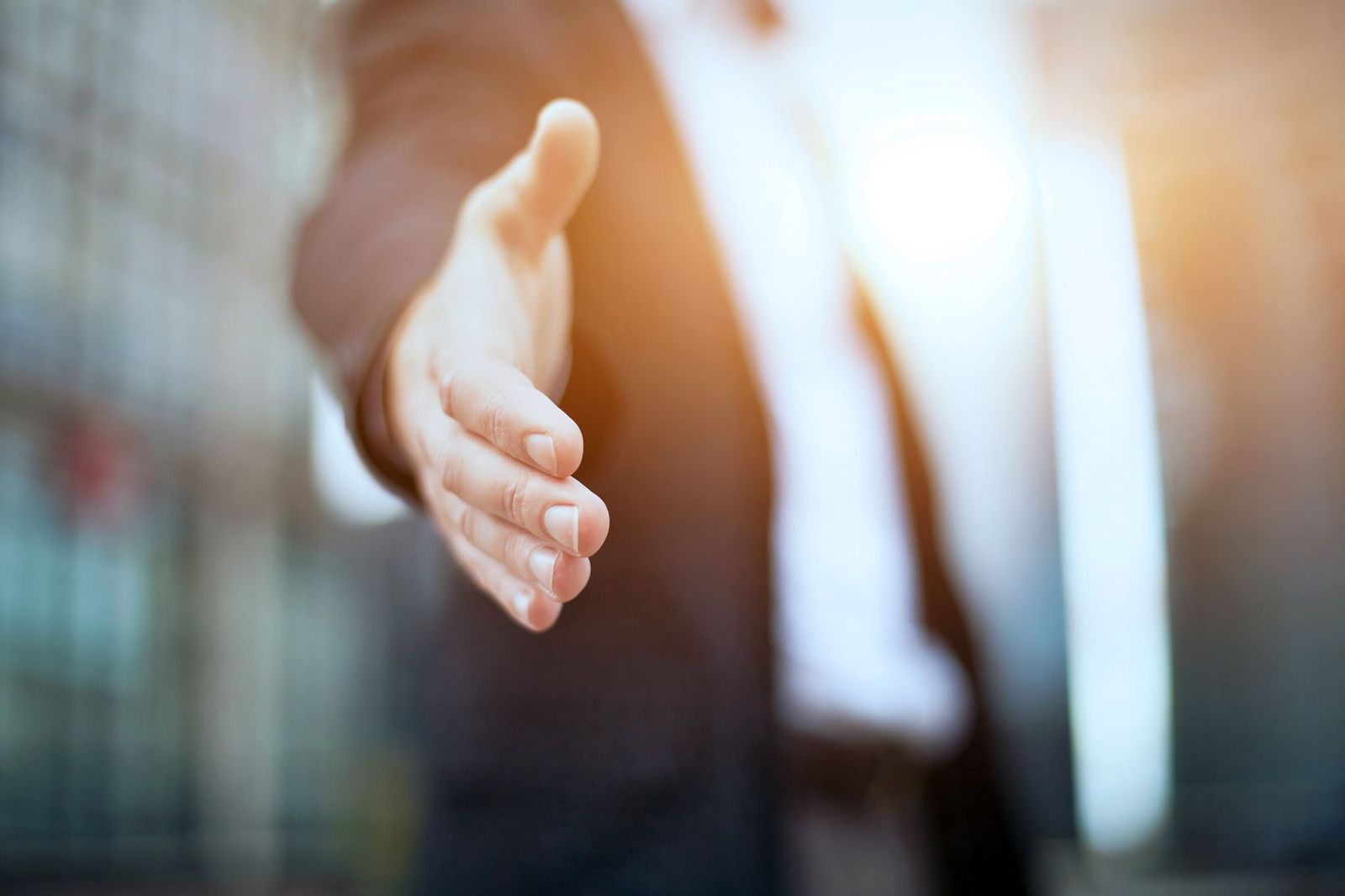 Shaking hands to meet and greet your audience is a technqiue that can improve your presentation skills