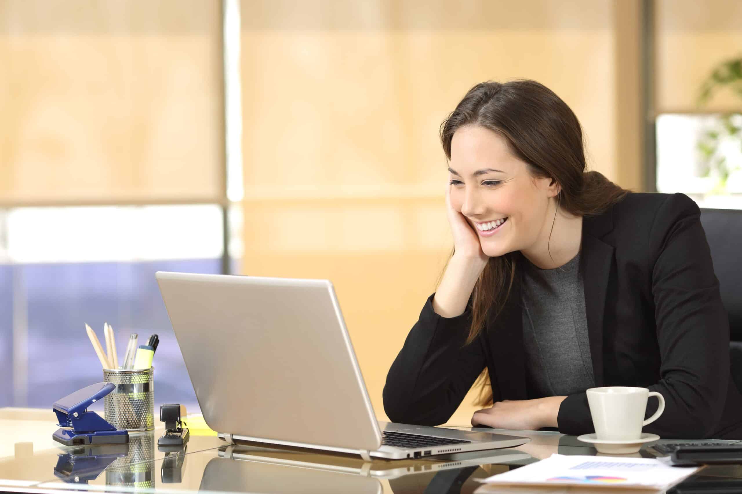 Woman video-conferencing at laptop
